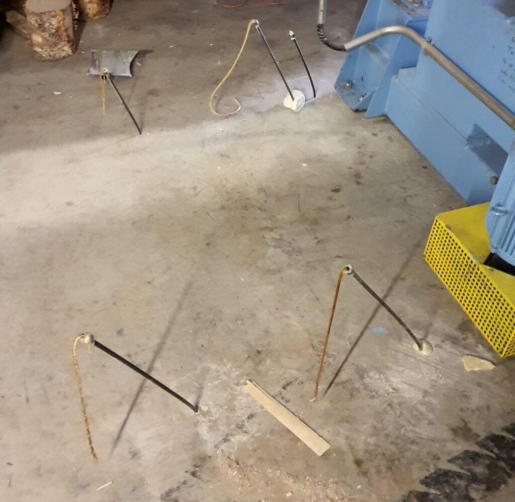 Geopolymer injection tubes installed for foundation reinforcement prior to injection