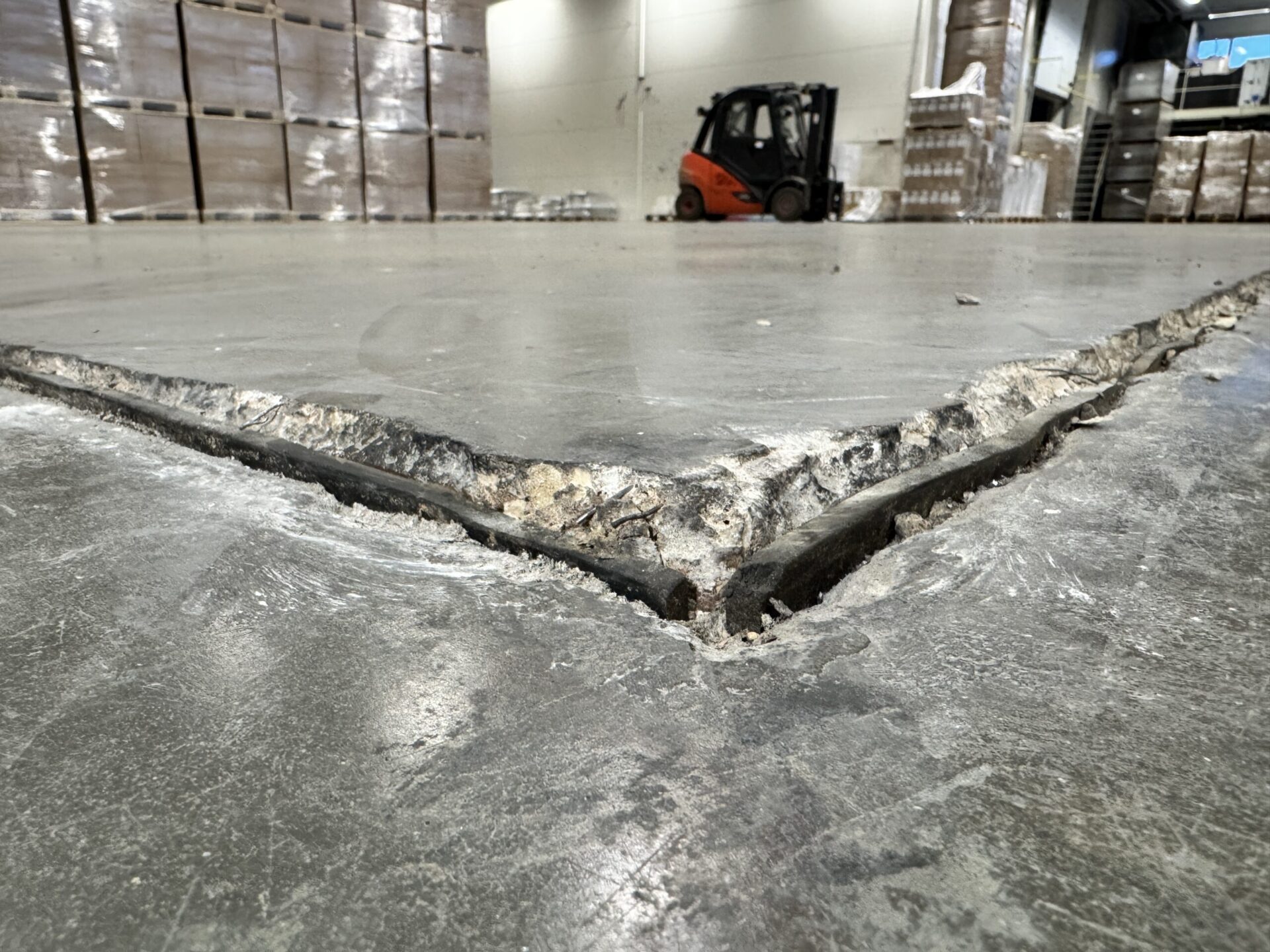 Concrete floor damage in an industrial warehouse