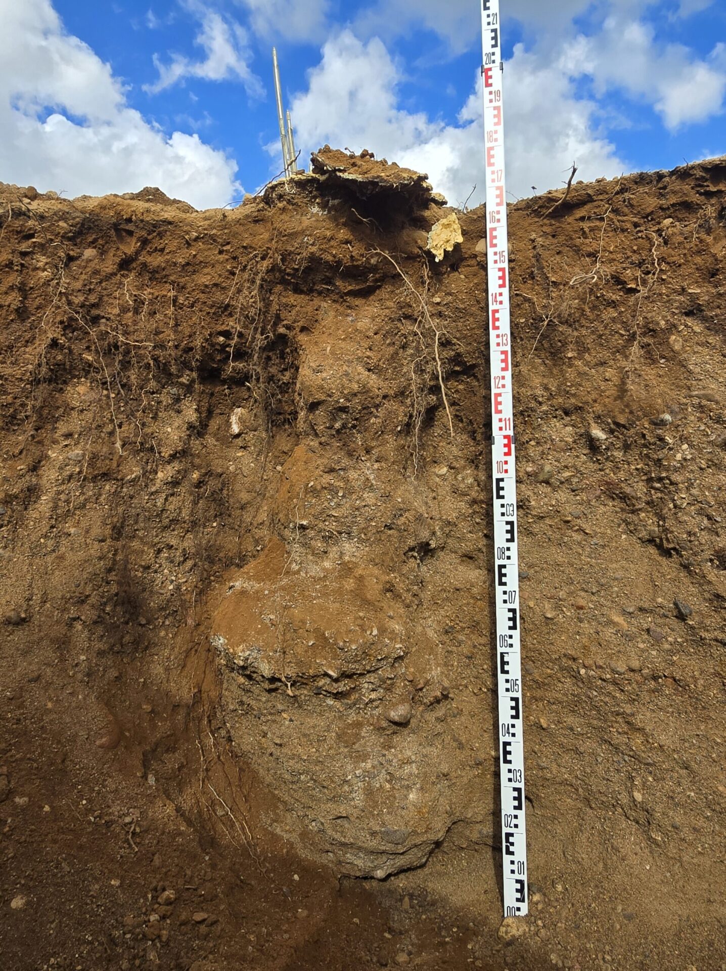 Excavated soil profile showing geopolymer injection zone for ground improvement research